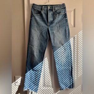 Denim jeans ankle cut with frayed ends
